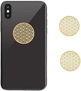 rondelle de plastoc avec un dessin pseudo-scientifique collée sur un téléphone portable